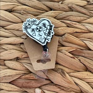 Heart-Shaped with Black and White Design
Badge reel